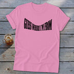 Pink t-shirt with black text that says "GUESS WHERE I'M FROM".