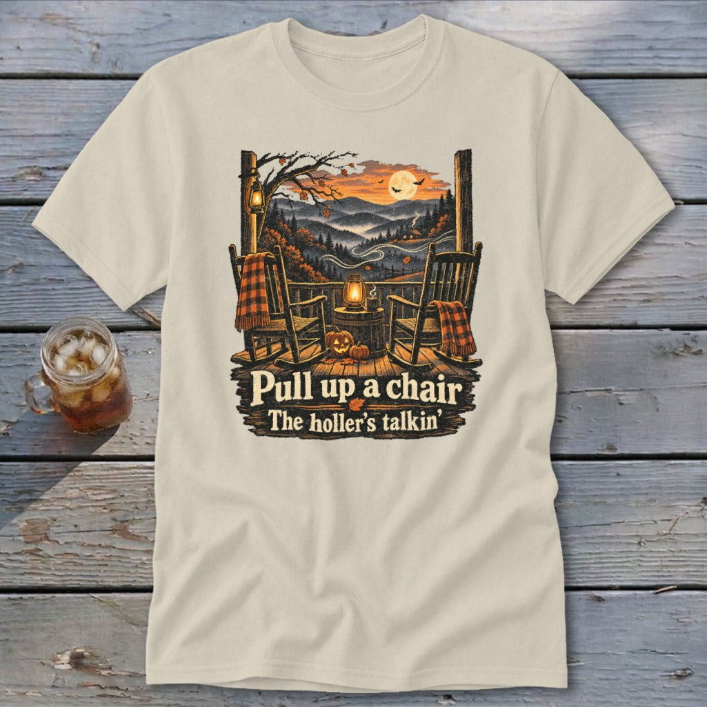 T-shirt with "Pull up a chair The holler's talkin'" and autumn porch scene.