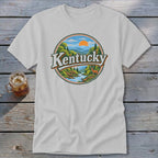 White t-shirt with a circular graphic depicting a scenic Kentucky landscape and the word "Kentucky."