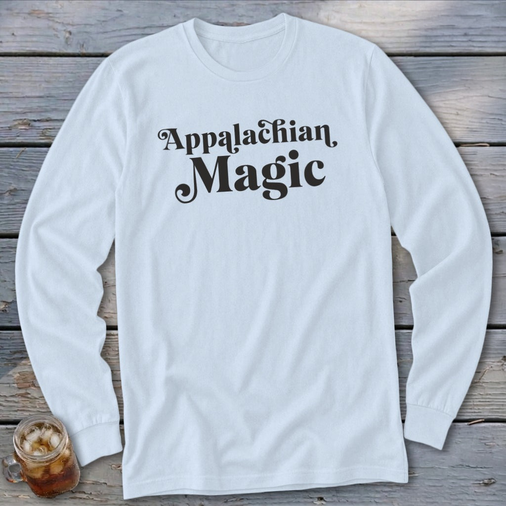 White long-sleeve shirt with "Appalachian Magic" text in black cursive font.