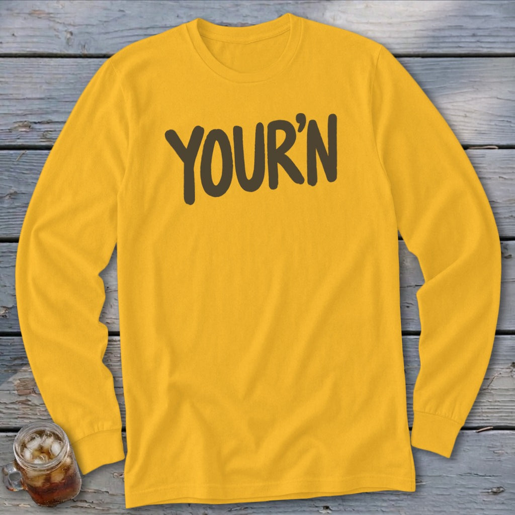 Yellow long-sleeve t-shirt with "YOUR'N" text in dark brown.