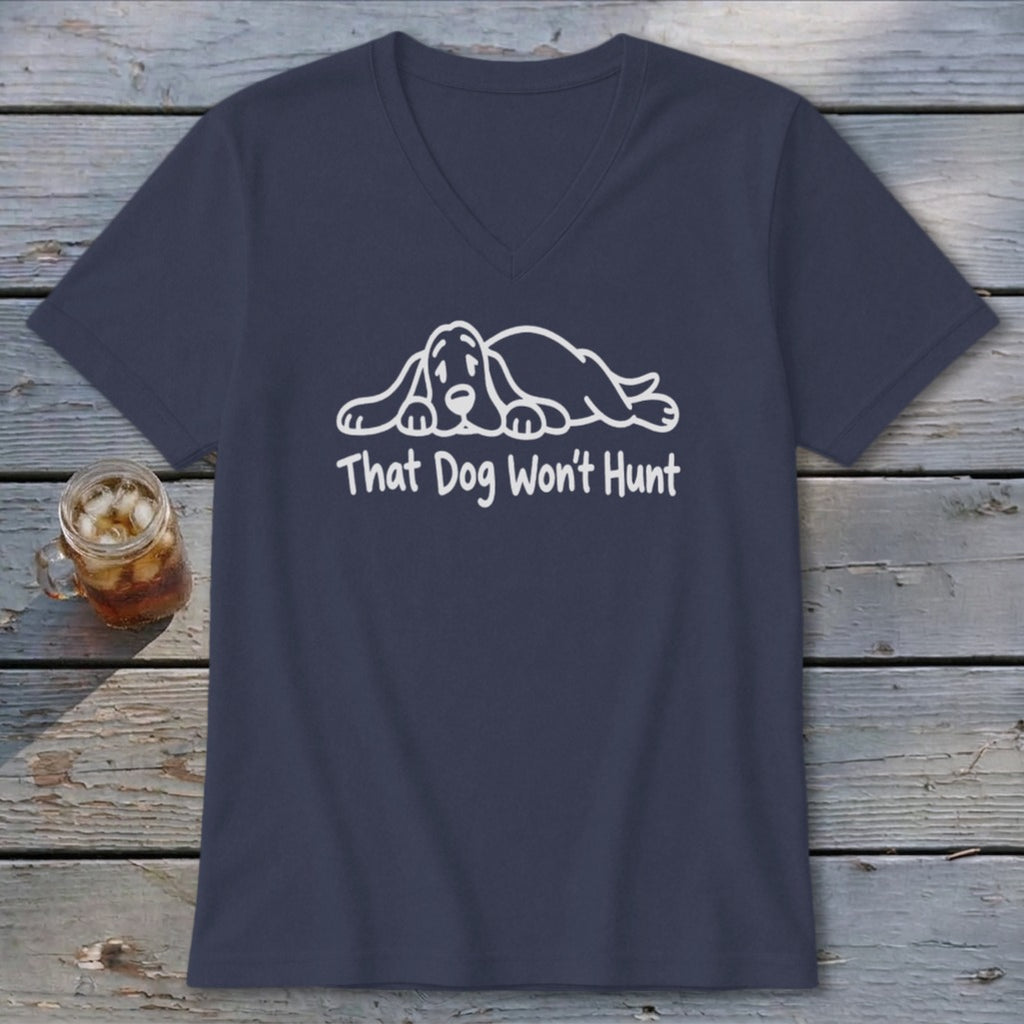 Dark blue V-neck T-shirt featuring a white graphic of a sleeping basset hound and the text "That Dog Won't Hunt".