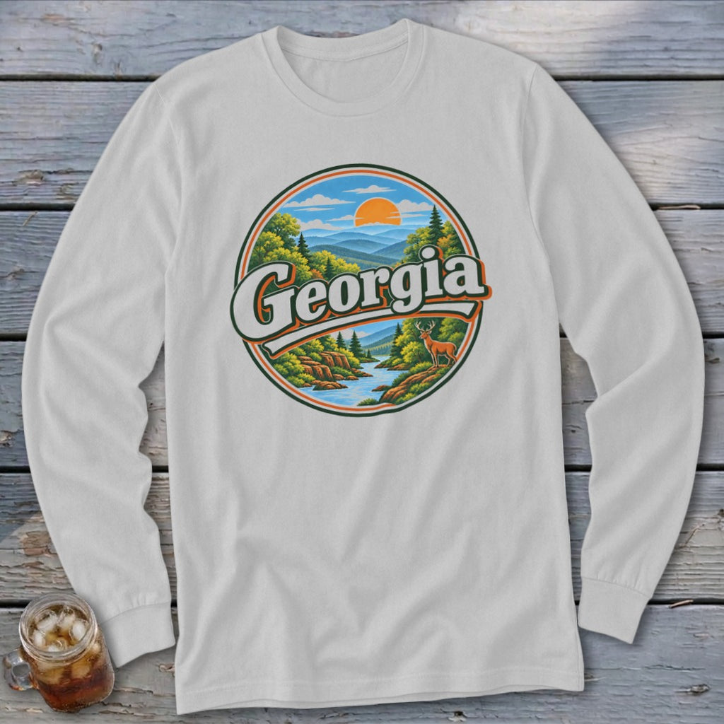 White long-sleeve shirt with a circular Georgia landscape graphic featuring mountains, river, deer, and sun.