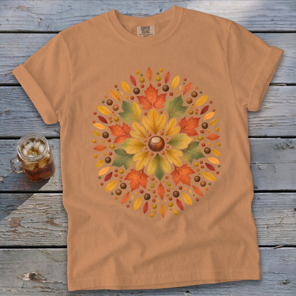 Orange t-shirt with a circular autumn leaf and chestnut design.