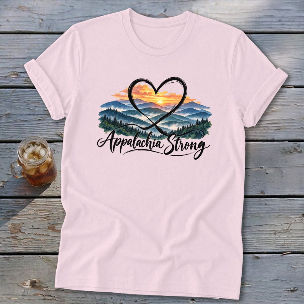 Pink t-shirt with "Appalachia Strong" text and a heart framing a mountain sunset.