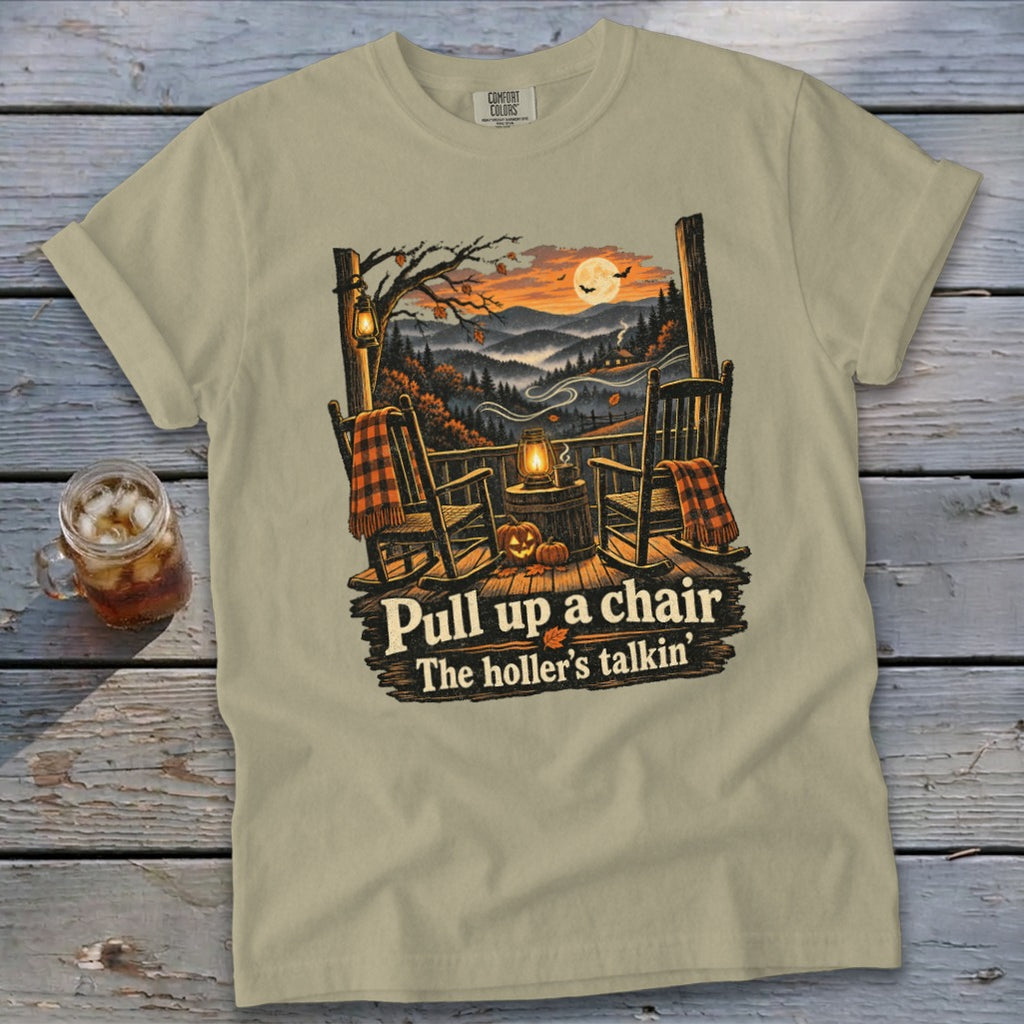 T-shirt with rocking chairs on porch, "Pull up a chair The holler's talkin'" text.