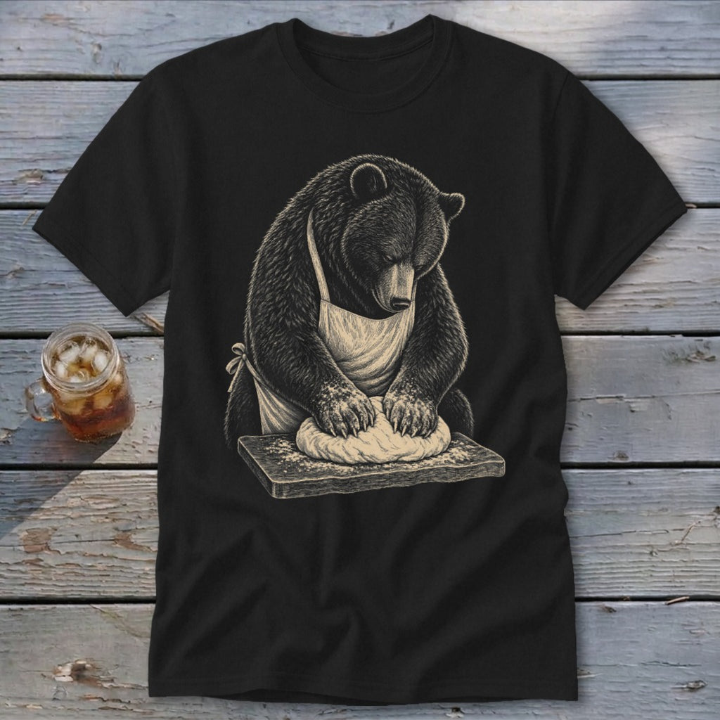 Bear wearing apron kneading dough on wooden board graphic on black t-shirt.