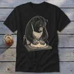 Bear wearing apron kneading dough on wooden board graphic on black t-shirt.