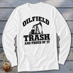 White long-sleeve shirt with black text "OILFIELD TRASH AND PROUD OF IT" and pumpjack graphic.
