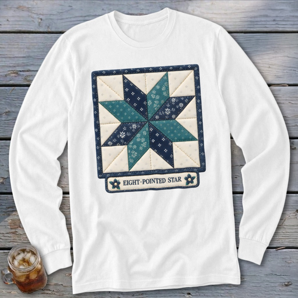 White long-sleeved shirt with an eight-pointed star quilt design and text.