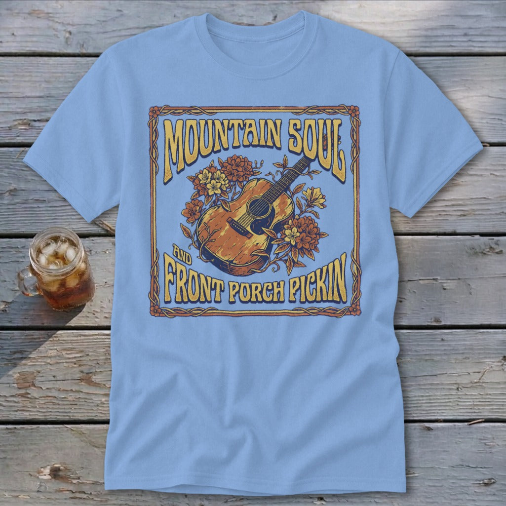Light blue t-shirt with "Mountain Soul and Front Porch Pickin'" text and a guitar graphic.