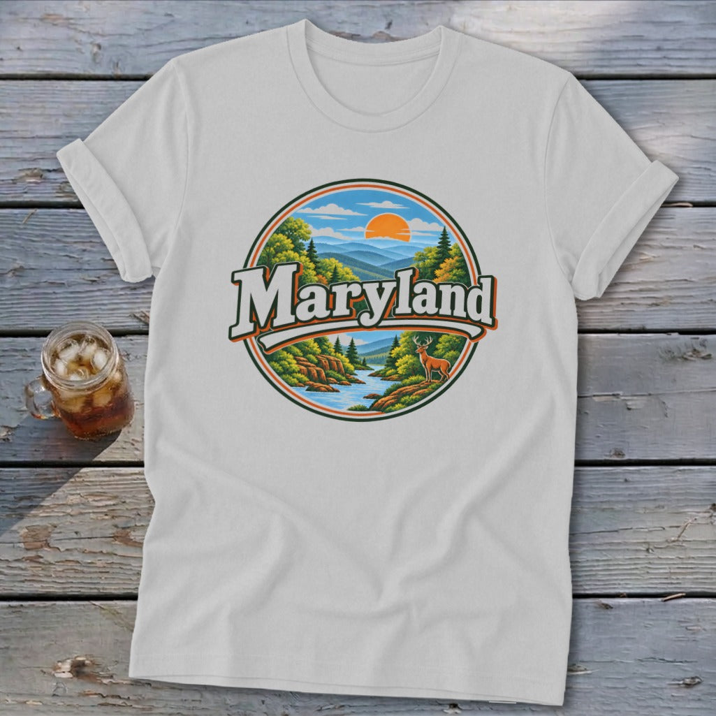 White t-shirt with circular Maryland landscape graphic featuring mountains, river, trees, and deer.