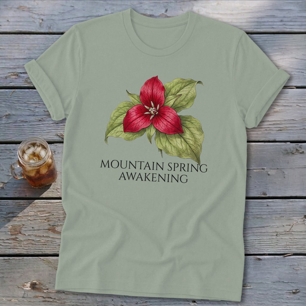 Light green t-shirt with a red trillium flower and text "MOUNTAIN SPRING AWAKENING".
