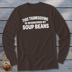 Brown long-sleeve shirt with white text reading THIS THANKSGIVING IS SPONSORED BY SOUP BEANS.