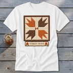 White t-shirt with a "Turkey Track" quilt block design and text.