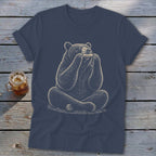 T-shirt graphic of a bear sitting cross-legged playing a harmonica.