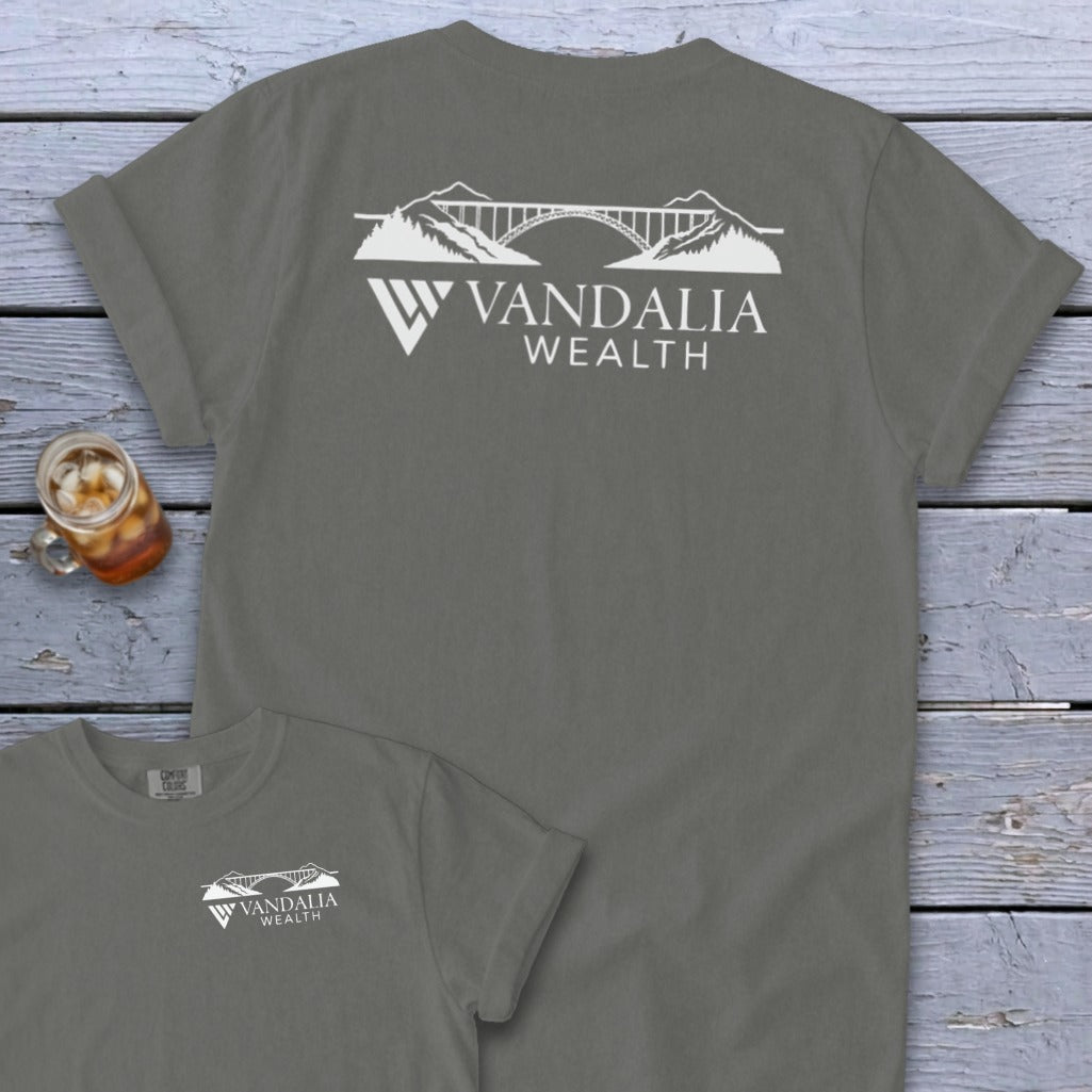Gray t-shirt with white Vandalia Wealth bridge logo on back and front pocket area.