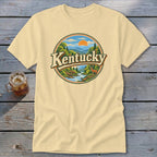 T-shirt with circular Kentucky landscape design featuring a deer and a river.