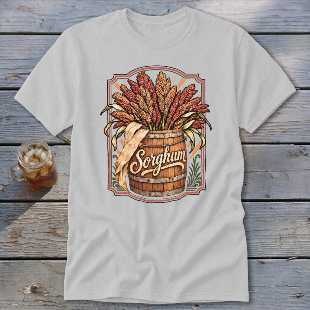 Sorghum text on barrel with grain stalks in decorative border on t-shirt.