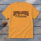 Orange t-shirt with "APPALACHIA #Alabama" printed in brown on the chest.