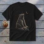 Black t-shirt with a bear sitting on a rock, looking at the moon and stars.