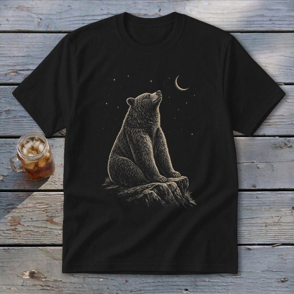 Black t-shirt with a bear sitting on a rock, looking at the moon and stars.