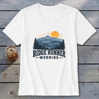 White t-shirt with "Ridge Runner Morning" text and mountain landscape graphic.