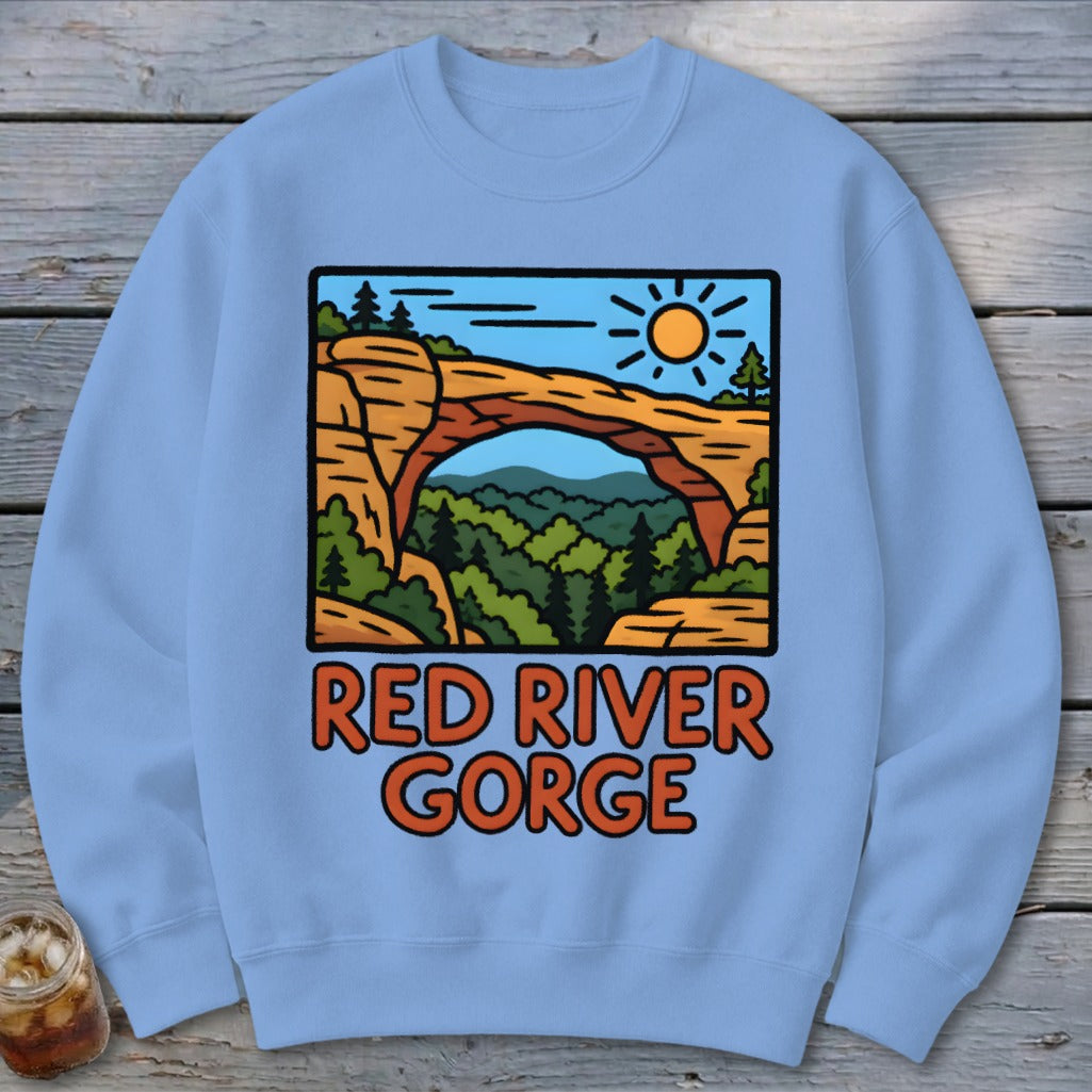 Light blue sweatshirt with a graphic of Red River Gorge and the text "RED RIVER GORGE".