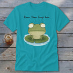 A bright blue t-shirt featuring a green frog on a lily pad with the text finer than frog's hair.