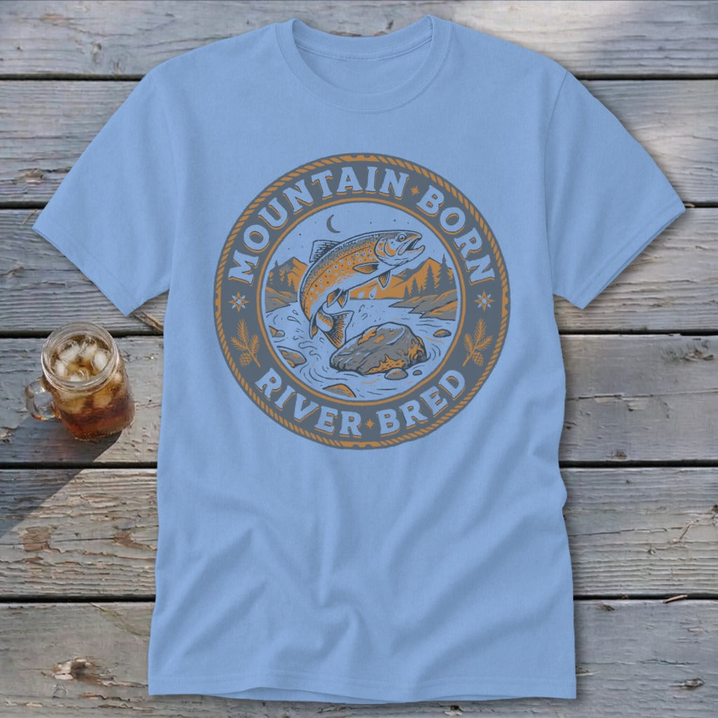Light blue t-shirt with a circular graphic of a jumping trout and the words "Mountain Born River Bred".