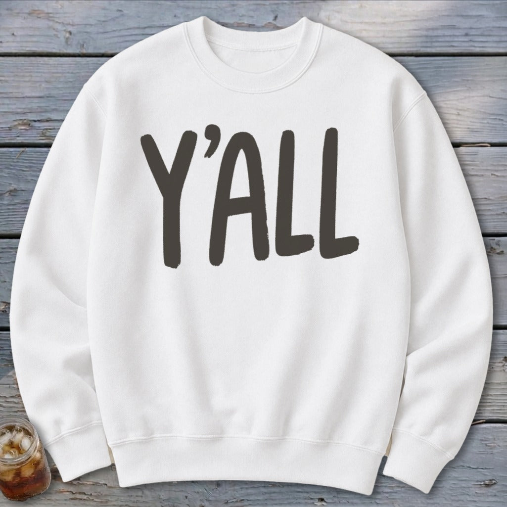 White crewneck sweatshirt with "Y'ALL" printed in dark gray text.