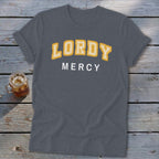Dark gray t-shirt with "LORDY MERCY" text in yellow and white.