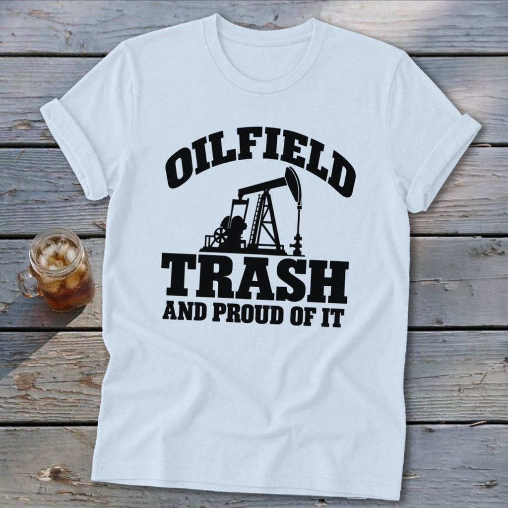 White t-shirt with black text and oil pump graphic: "Oilfield Trash And Proud Of It."