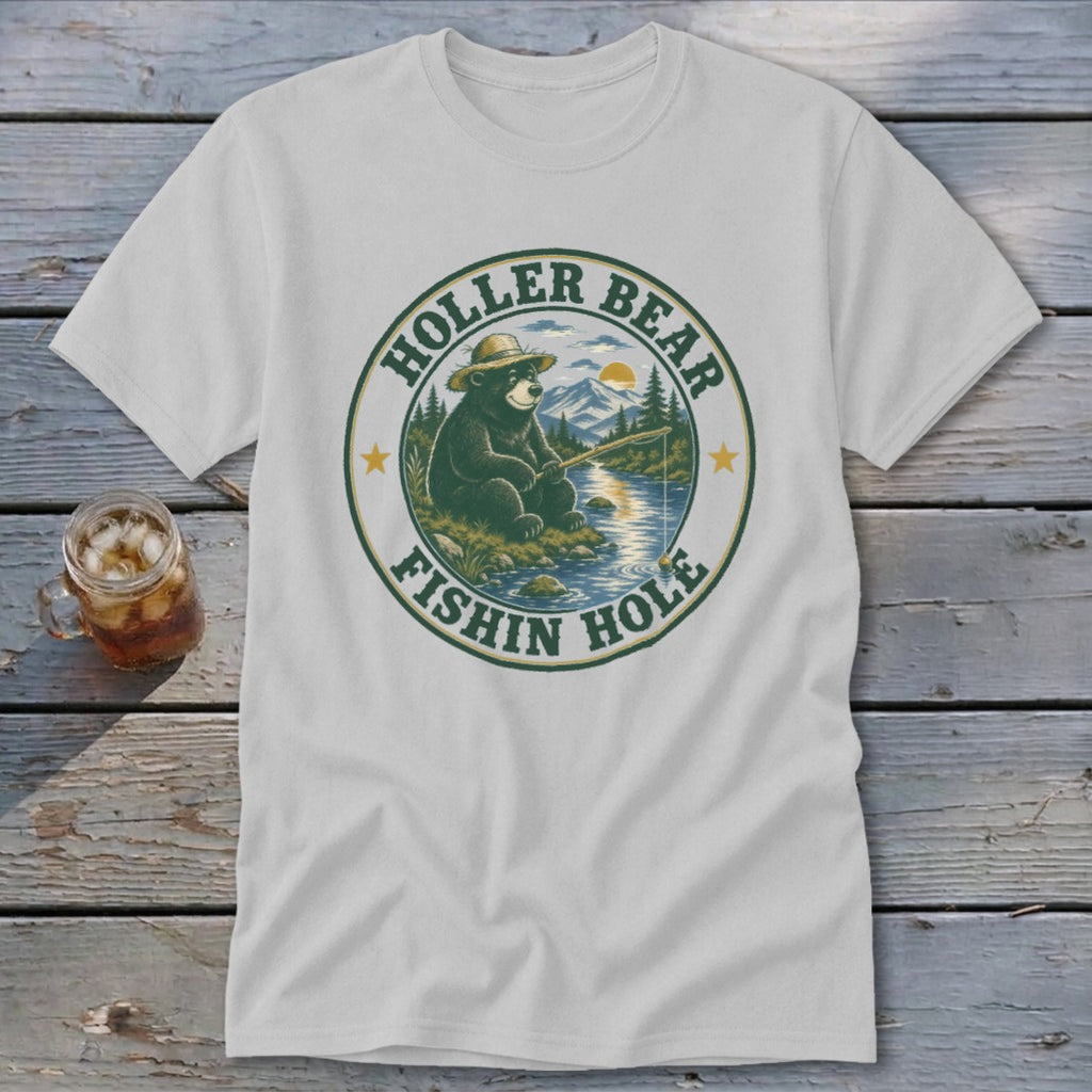 T-shirt graphic: bear in hat fishing by river, text "Holler Bear Fishin Hole".