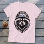 Pink t-shirt with a black and white sketch of a raccoon wearing a beanie with a mountain patch.