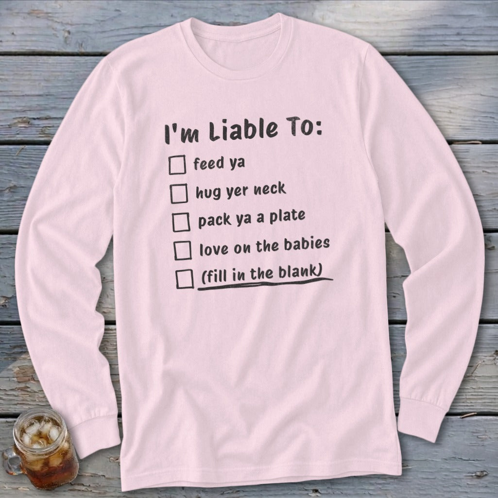 Pink long-sleeve shirt with "I'm Liable To:" checklist and fill-in-the-blank line.