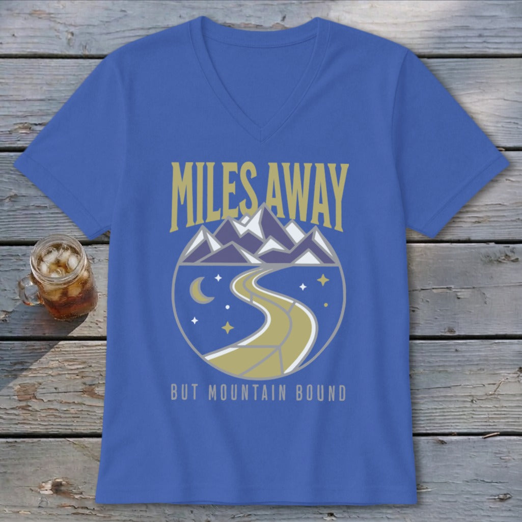 Blue v-neck t-shirt with "Miles Away But Mountain Bound" text and mountain graphic.