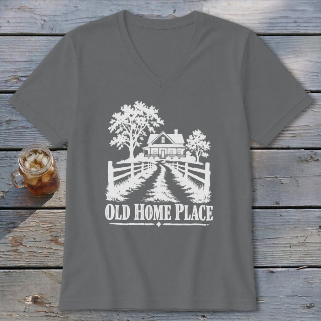 Grey v-neck t-shirt with white graphic of a farmhouse, trees, fence, and text "OLD HOME PLACE".