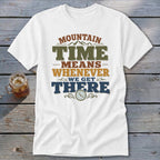 White t-shirt with text "Mountain Time Means Whenever We Get There" and a clock.