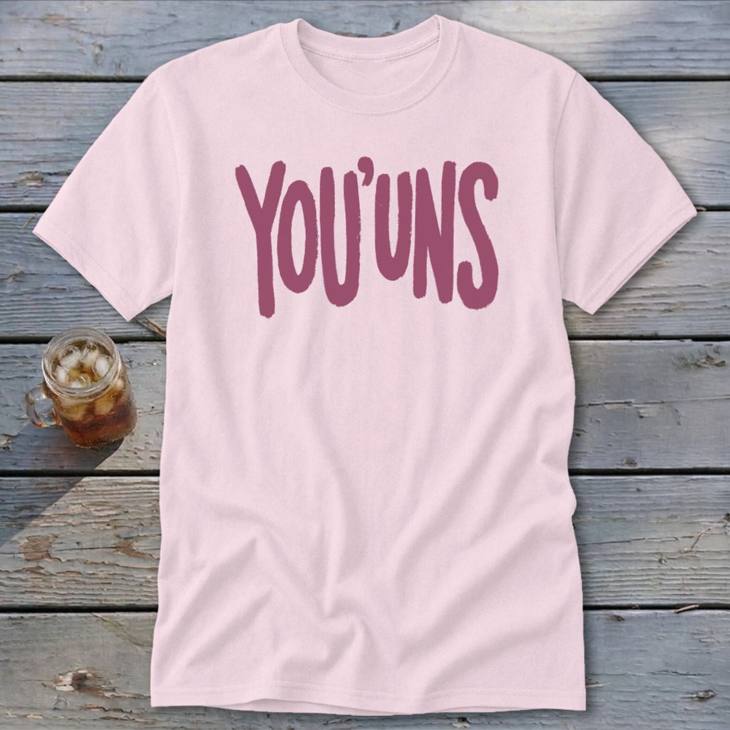 Light pink t-shirt with "YOU'UNS" in dark pink text.