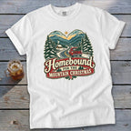 White t-shirt with "Homebound For The Mountain Christmas" graphic.