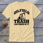 Cream t-shirt with black text and oil pump graphic: "Oilfield Trash and Proud of It".