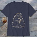 Dark blue v-neck t-shirt with a graphic of a bear carving wood with a knife.