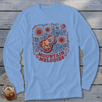 Light blue long-sleeve t-shirt with a folk-art graphic of an acoustic guitar, sunflowers, and the text MOUNTAIN MELODIES.
