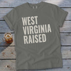 Gray t-shirt with "WEST VIRGINIA RAISED" text in white block letters.