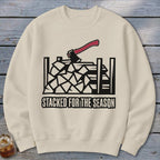 Light-colored sweatshirt with a graphic of an axe in firewood and text.