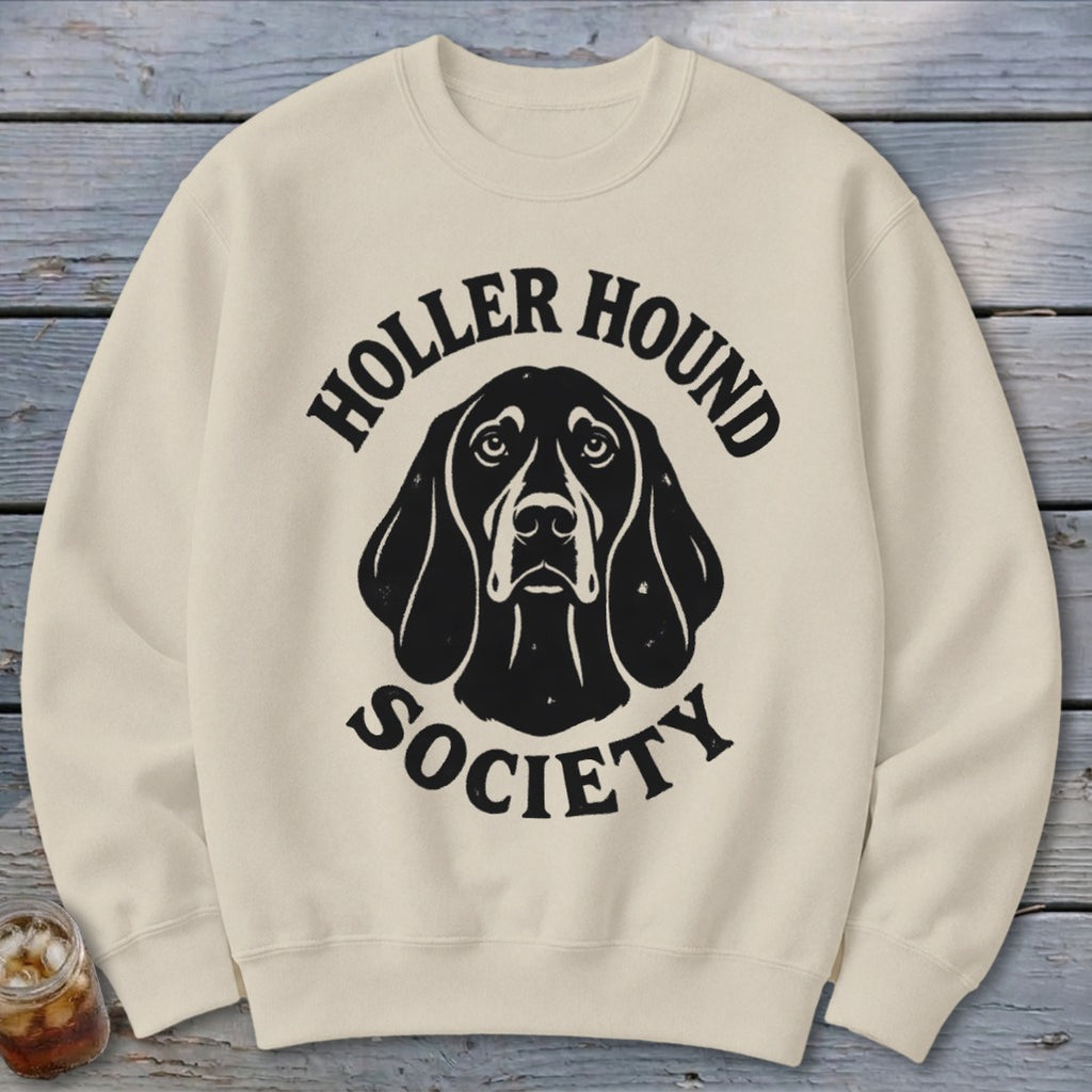 Cream sweatshirt with black "Holler Hound Society" text and dog graphic.