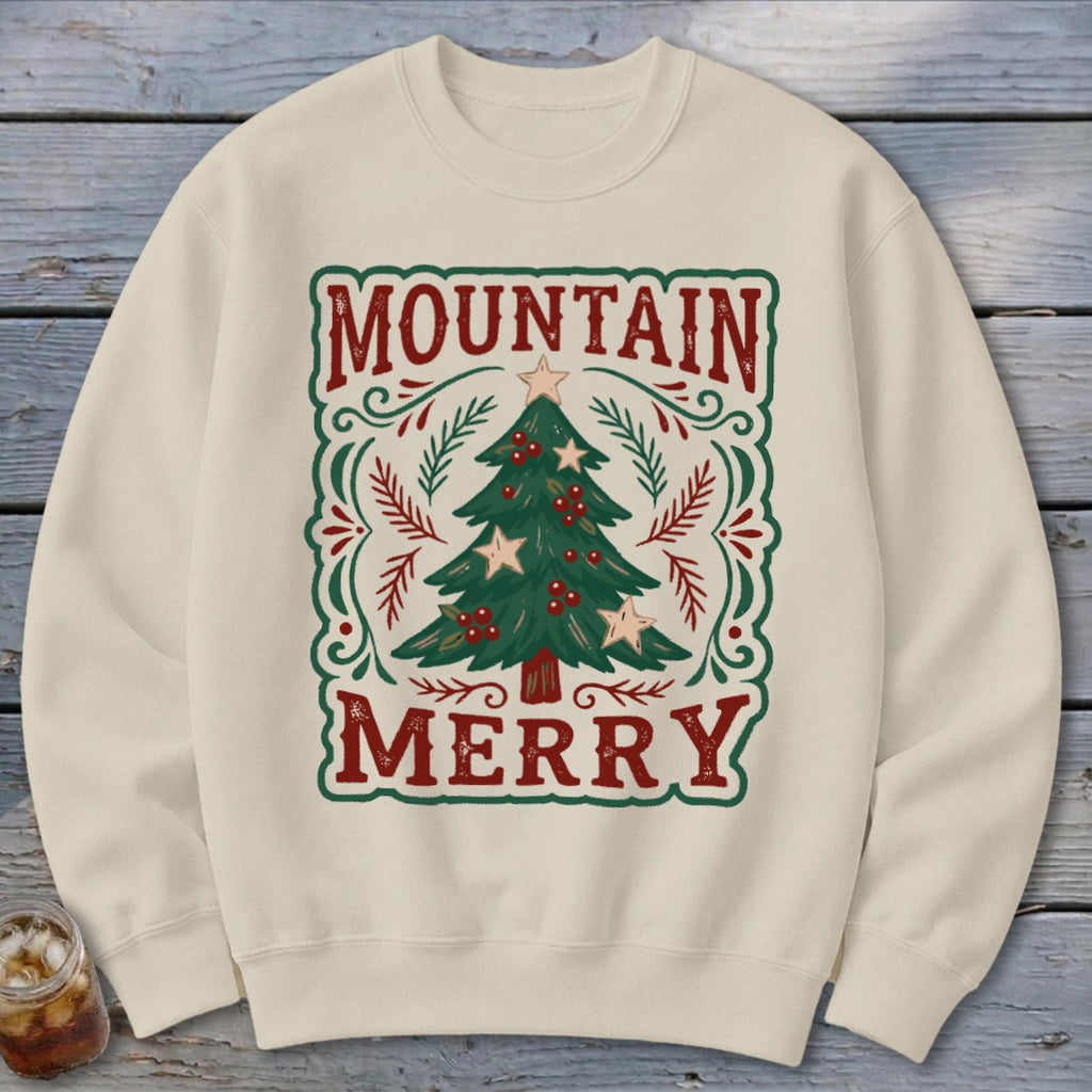 Beige crewneck sweatshirt featuring a graphic of a decorated Christmas tree with the text MOUNTAIN MERRY.