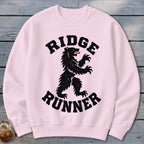 Pink crewneck sweatshirt with black bear graphic and text "RIDGE RUNNER".