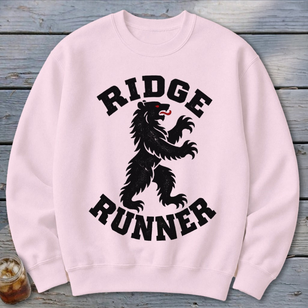 Pink crewneck sweatshirt with black bear graphic and text "RIDGE RUNNER".